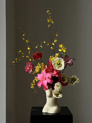 Flowers in a container / images for scale only