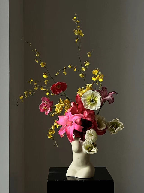 Flowers in a container / images for scale only