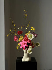 Flowers in a container / images for scale only